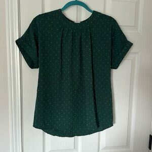 Green work top with button back closure